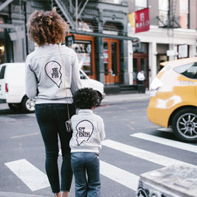 Destiney and her child in the city