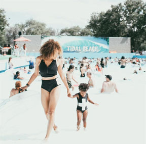 Destiney and her child at the pool